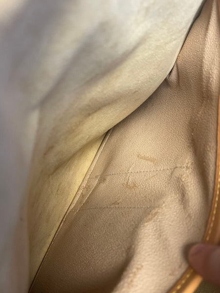 Louis Vuitton Rivoli Handbag in Monogram Canvas