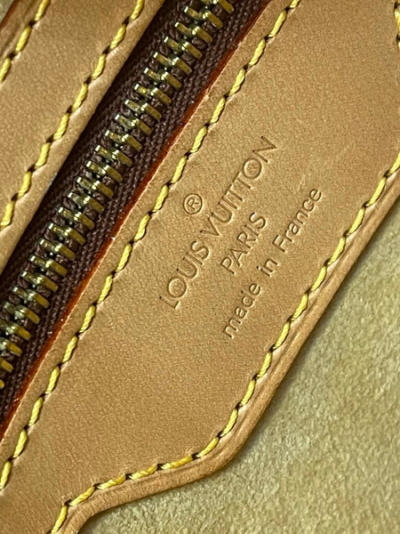 Louis Vuitton Rivoli Handbag in Monogram Canvas