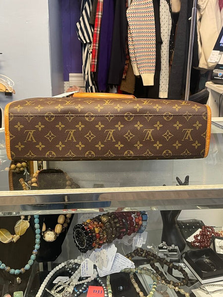 Louis Vuitton Rivoli Handbag in Monogram Canvas