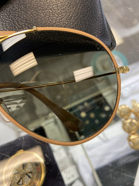 *Fellow Earthlings Leather wrapped sunglasses